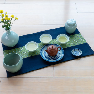 Dark blue with green flower
