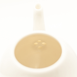 Mini théière en porcelaine blanc ivoire en forme d'oeuf